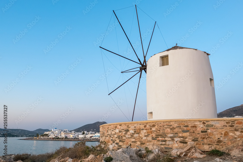 Traditional cycladic windmill at sunset on Paros island, Cyclade
