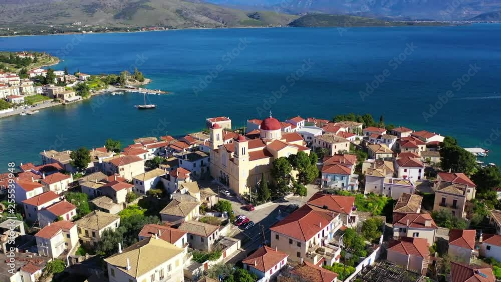 Aerial drone video from famous picturesque and traditional marine village of Galaxidi with unique character, Fokida, Greece