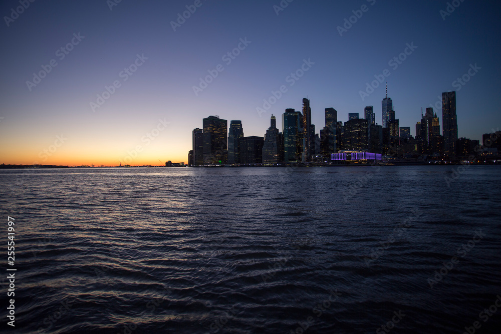 Sunset over Manhattan seen from Brooklyn Hights across the East river.