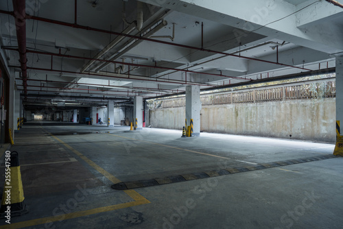 old parking lot with lighting  concrete building