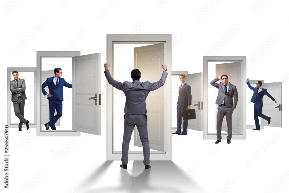 Businessman in uncertainty concept with many doors Businessman in uncertainty concept with many doors