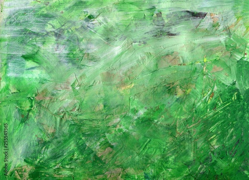 Abstract background of green color. The texture of the brush, scratches, stains on paper.