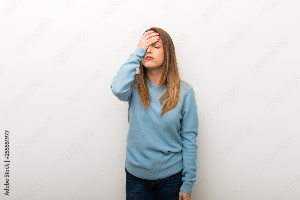 Blonde woman on isolated white background with surprise and shocked facial expression Blonde woman on isolated white background with surprise and shocked facial expression