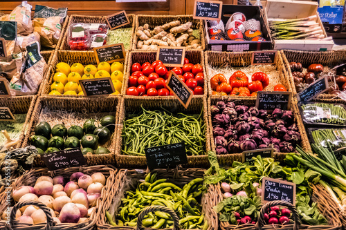 fruit and vegetables at the counter of a covered market