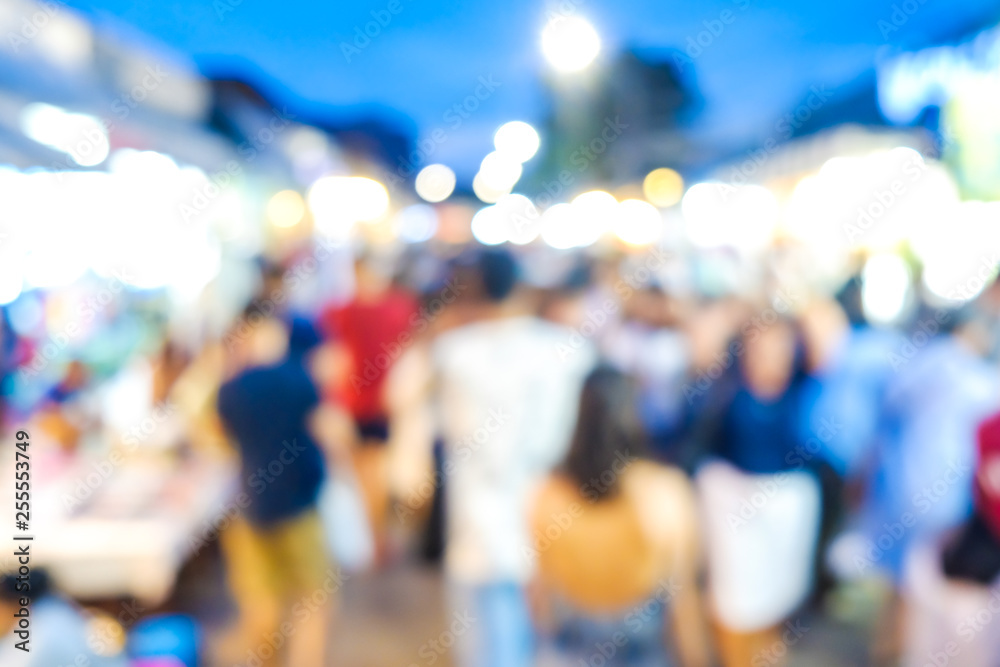 Group of blurred people shopping in outdoor market Group of blurred people shopping in outdoor market