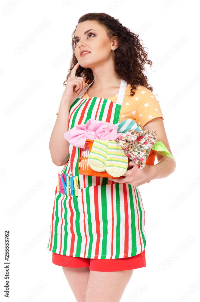 Young housewife with laundry basket, isolated on white background Young housewife with laundry basket, isolated on white background