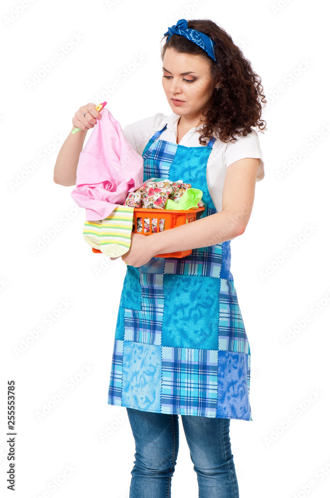 Young housewife with laundry basket, isolated on white background Young housewife with laundry basket, isolated on white background