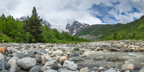 Mountain river Adishtchala flowing from glacier Lardaad on mount Tetnuldi.