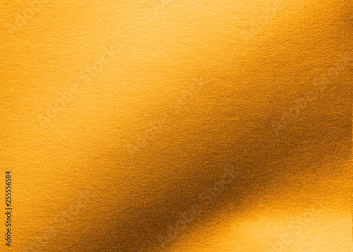 Copper gold paper texture metallic wrapping foil sheet shiny orange background for wallpaper decoration element
