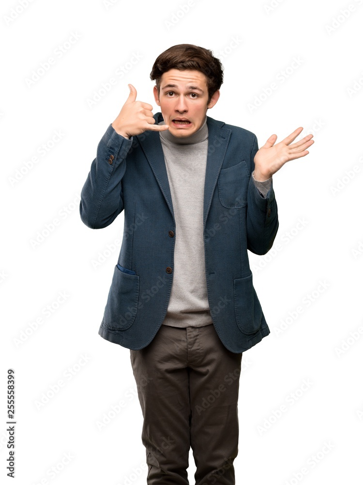 Teenager man with turtleneck making phone gesture and doubting over isolated white background Teenager man with turtleneck making phone gesture and doubting over isolated white background