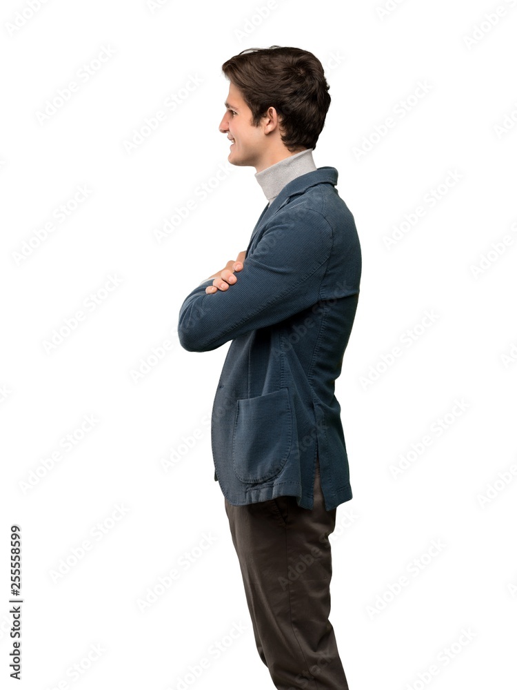 Teenager man with turtleneck in lateral position over isolated white background Teenager man with turtleneck in lateral position over isolated white background