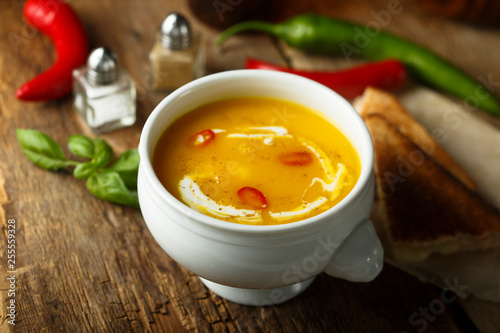 Homemade pumpkin soup with chili pepper