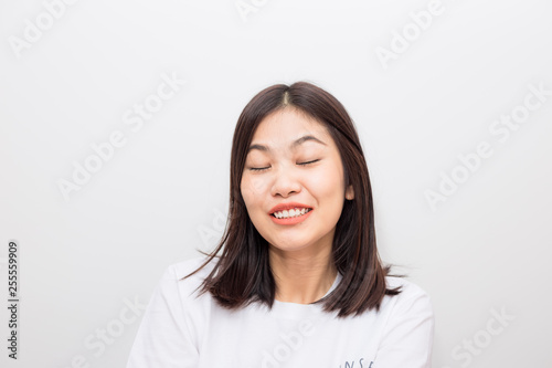 Asian beautiful smiling women portrait on white background © themorningglory