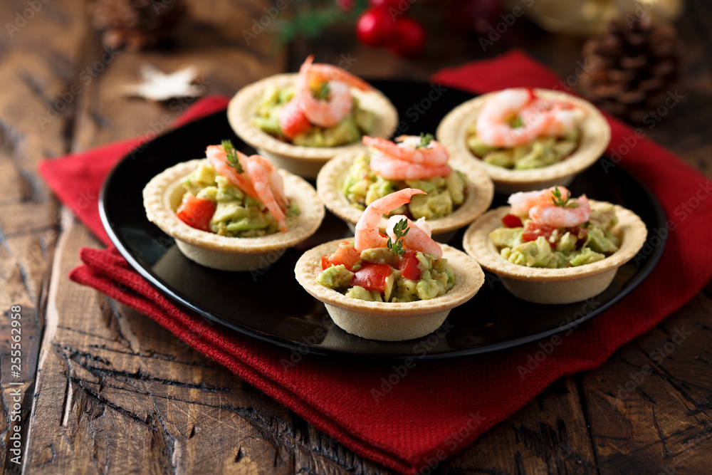 Shrimp and salmon appetizers with avocado cream
