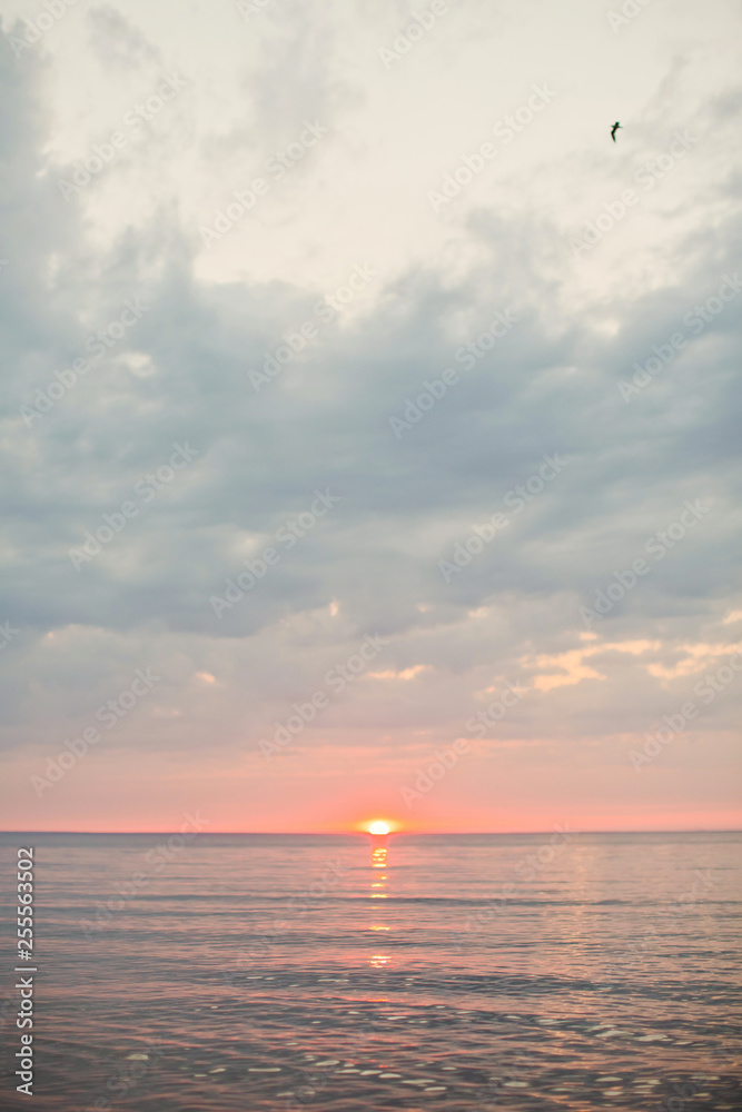 sunset with sun under the sea surface sunset with sun under the sea surface
