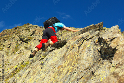 A climbing man on the rock