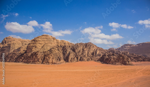 Wadi Rum rocks bare mountain ridge Jordanian desert panorama scenery landscape travel and touristic photography 