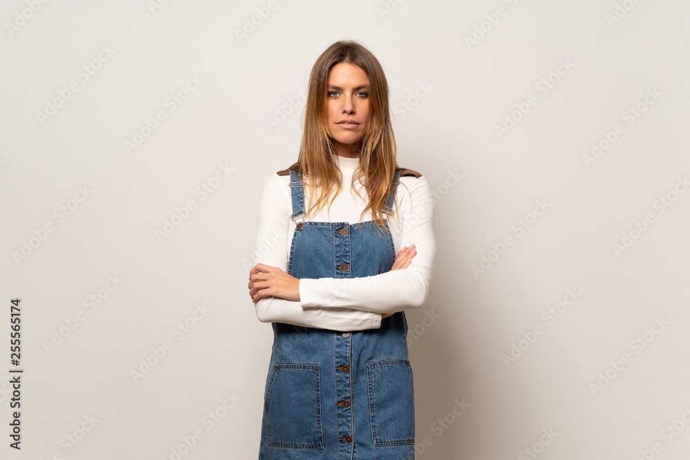 Beautiful woman over isolated white wall portrait Beautiful woman over isolated white wall portrait