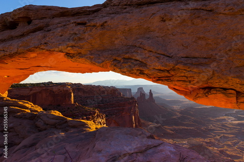 Iconic tourist attraction Mesa Arch in Canyonlands National Park, Utah, at sunrise
