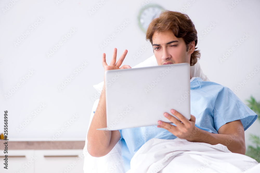 Young male patient lying on couch in hospital Young male patient lying on couch in hospital