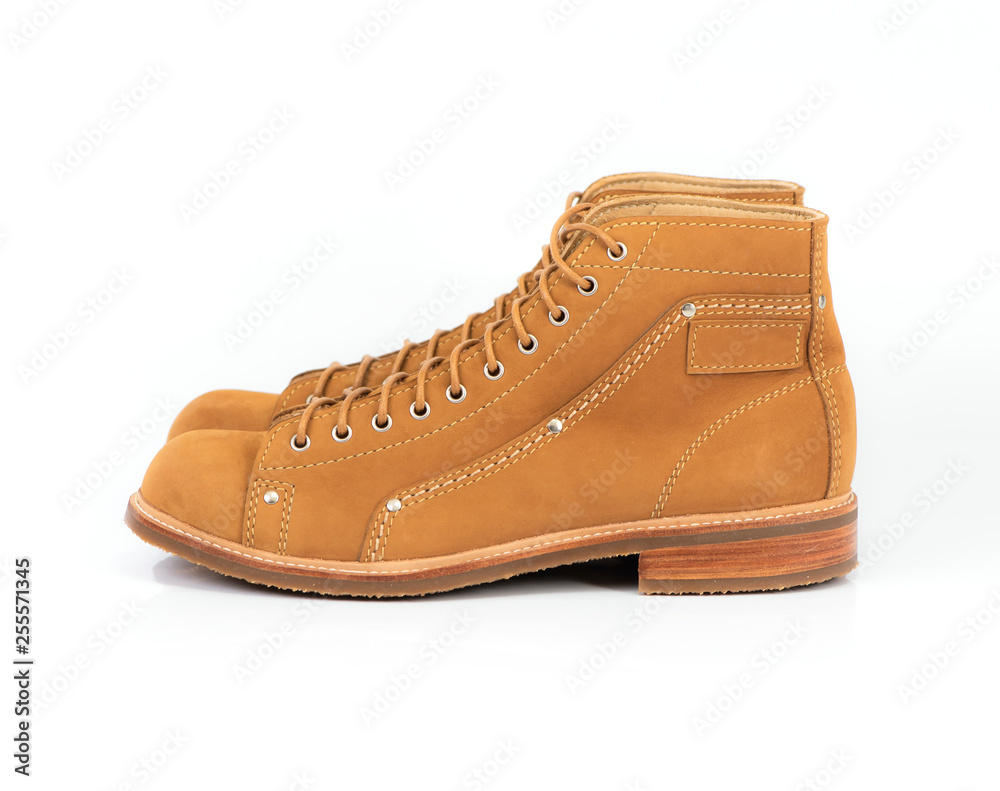 Men’s brown  boot with nubuck leather for man collection isolated on a white background.