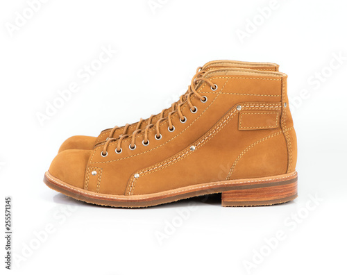 Men’s brown boot with nubuck leather for man collection isolated on a white background.
