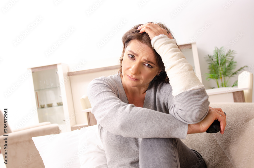 Woman after car accident suffering at home Woman after car accident suffering at home