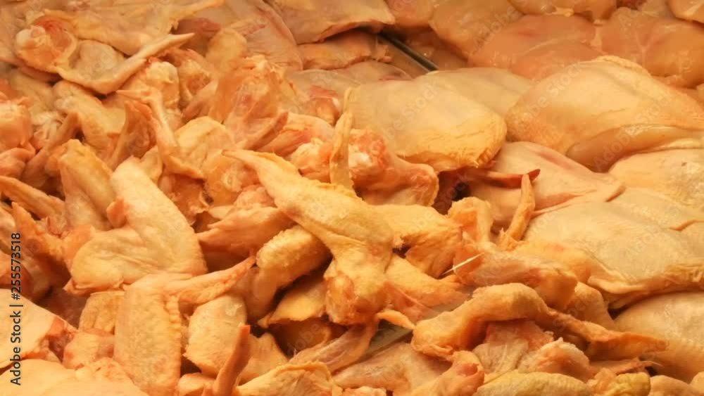 A large number of chicken giblets, entrails, wings, legs, stomachs