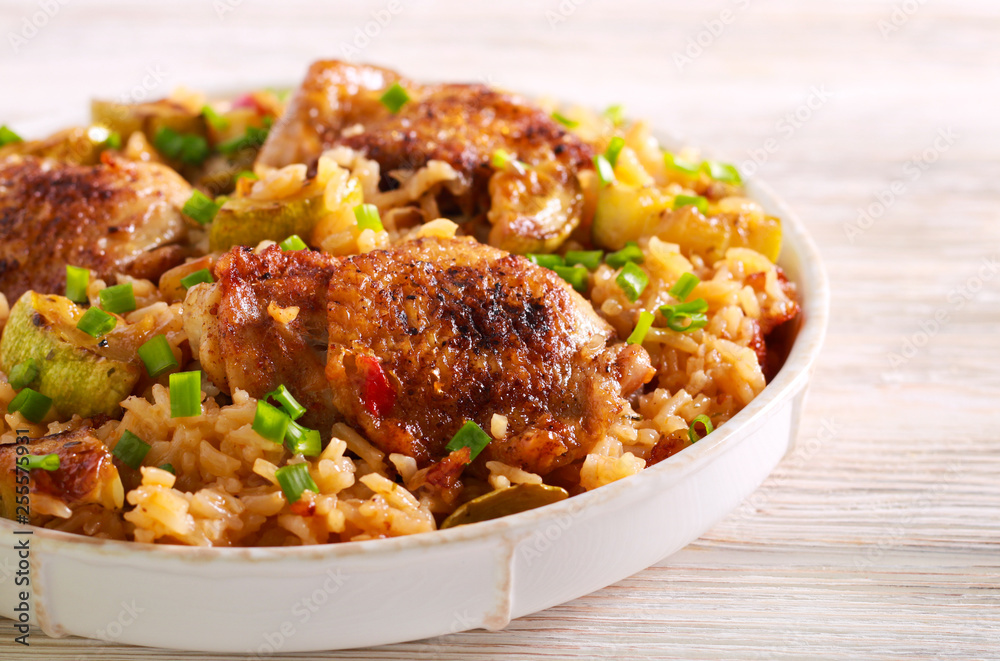 Chicken thighs with rice and zucchini casserole Chicken thighs with rice and zucchini casserole