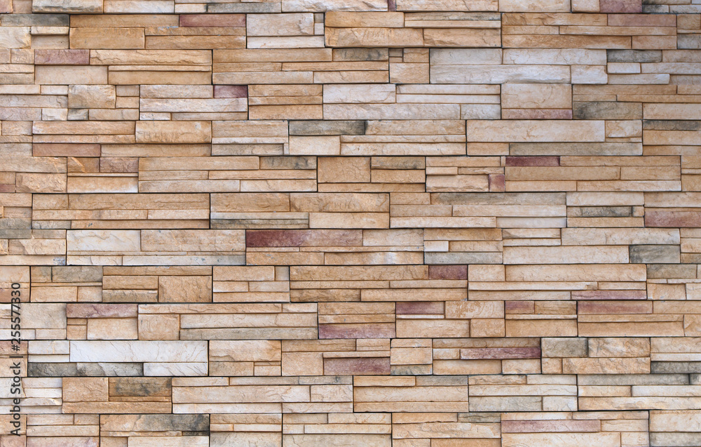 beige stone brick block wall rock texture background beige stone brick block wall rock texture background