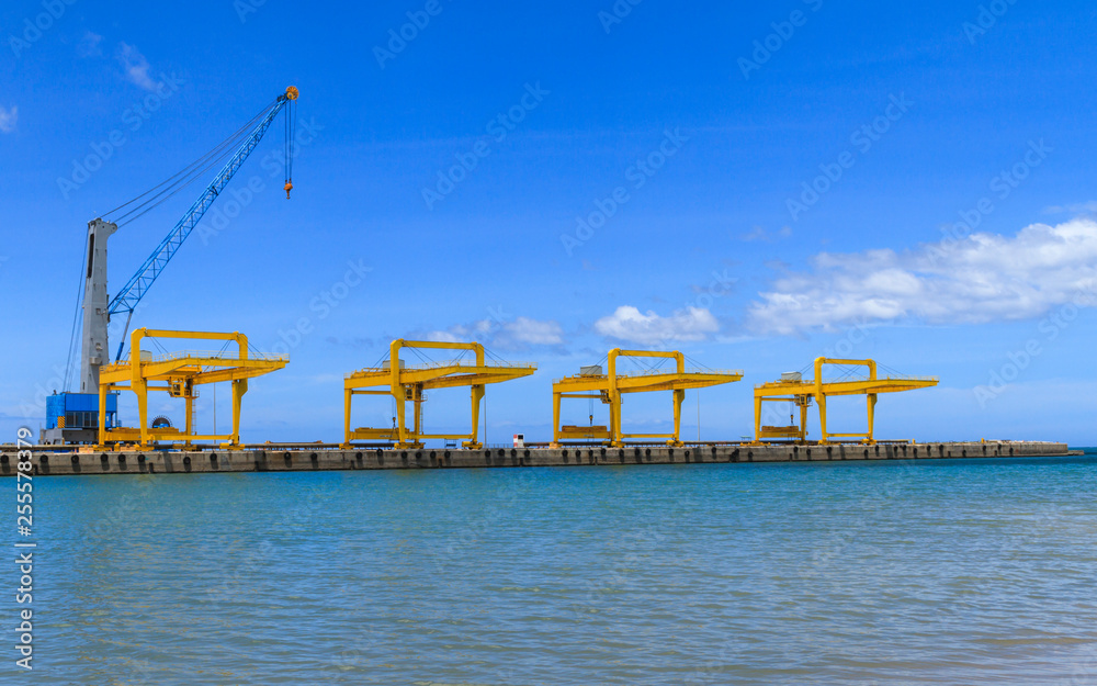 Gantry Cranes In A Commercial Dock, Deep Sea Port At prachuabkhirikhan Bangsaphan Province. Gantry Cranes In A Commercial Dock, Deep Sea Port At prachuabkhirikhan Bangsaphan Province.