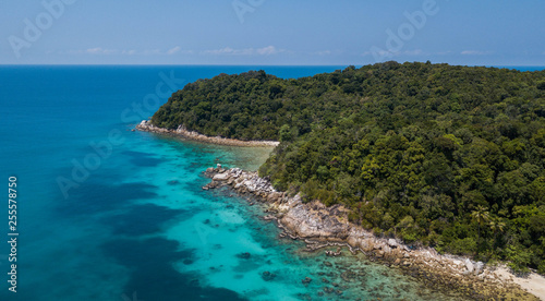 Aerial view of beautiful panoramic landscape of tropical Perhentian island with sandy beach of crystal water and jungle in Malaysia