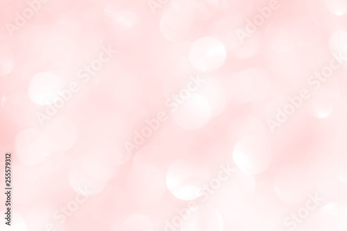 A shiny pink New Year's background for a holiday card. A wallpaper with a blurry pattern.