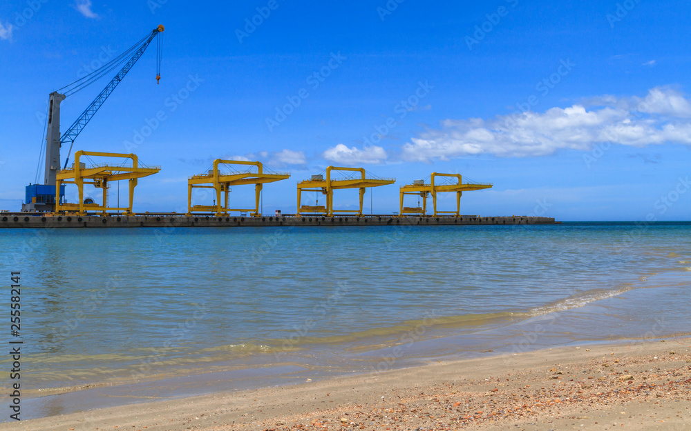 Gantry Cranes In A Commercial Dock, Deep Sea Port At prachuabkhirikhan Bangsaphan Province. Gantry Cranes In A Commercial Dock, Deep Sea Port At prachuabkhirikhan Bangsaphan Province.