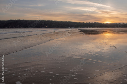 Landscape image of Oxwich Bay at sunset in the Gower Peninsula  South Wales. 