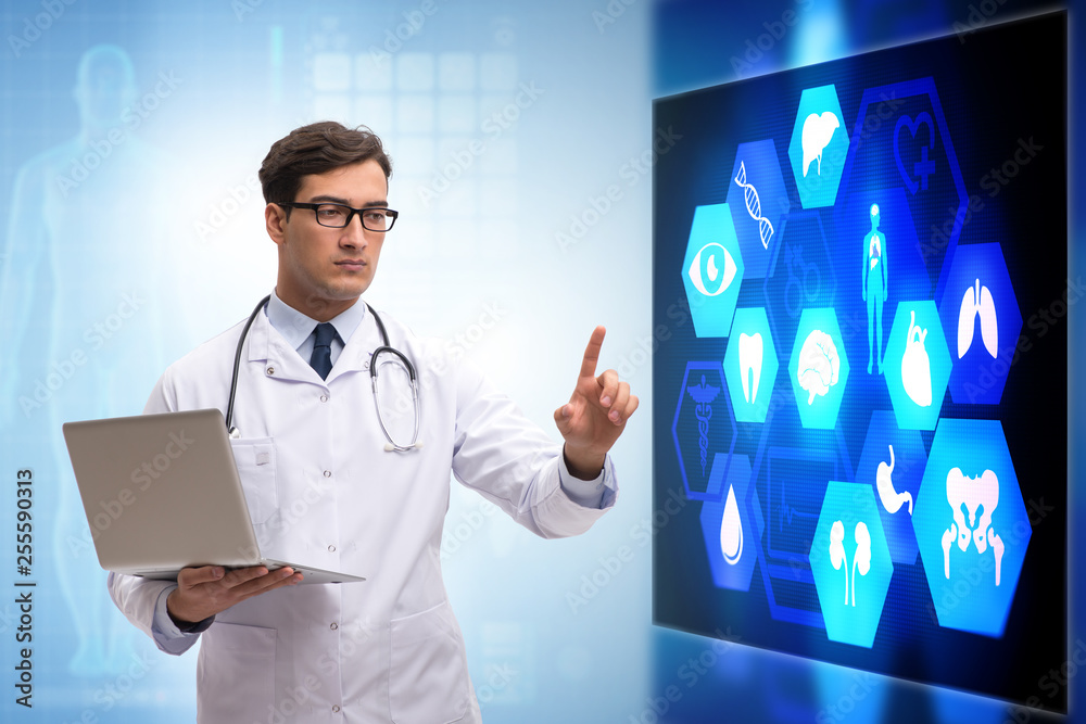 Doctor in telemedicine concept looking at screen Doctor in telemedicine concept looking at screen