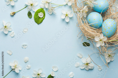 painted blue Easter eggs in...