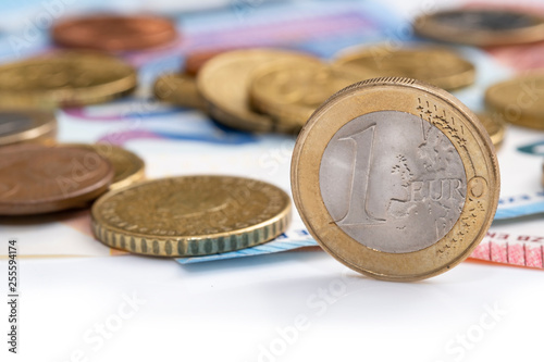 Euro money, coins and banknotes, the focus on the coin photo