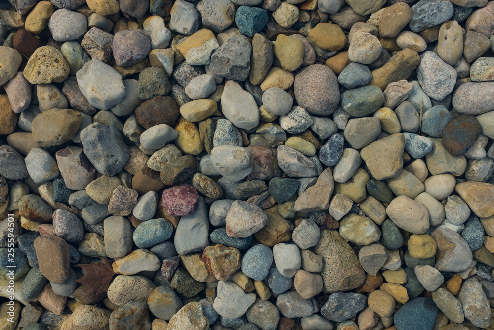 colorful pebbles on the beach colorful pebbles on the beach