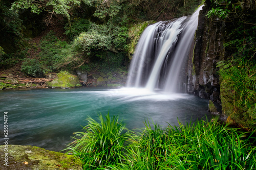 Waterfall in green forest  Japan  horizontal