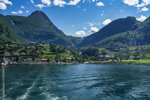 Geiranger village viewed from sightseeing boat on a cruise in the Geirangerfjord  Sunnmore  More og Romsdal  Norway