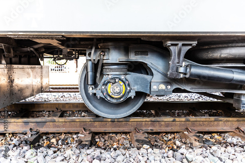 Close up modern wheel train system on track