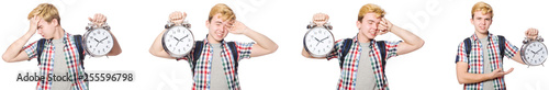 Young boy with alarm-clock in time management concept 