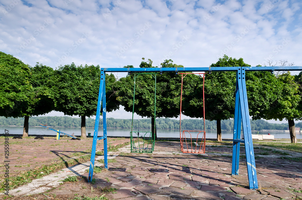 Swings in the open space in Ruse, near the river Danube Swings in the open space in Ruse, near the river Danube