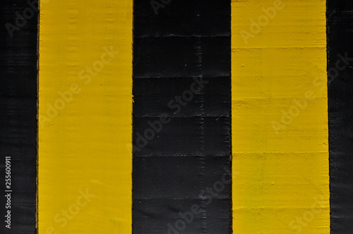 Wooden striped black and yellow background. Wooden texture, copy space