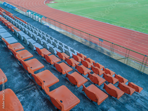 Colorful plastic seats at the stadium.