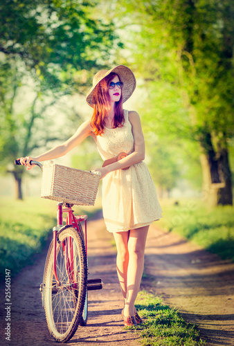 Girl on a bike in the countryside