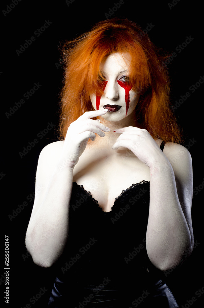Fototapeta premium Beautiful Young woman as sexy vampire halloween portrait