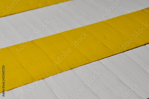 Wooden striped white and yellow background. Wooden texture, copy space