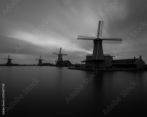 Long exposure capture of sunrise at the windmills of Zaanse Schans, Netherlands